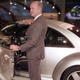 Volkswagen AG chairman, Dr. Ferdinand Piech, poses next to the next generation beetle at the North American International Auto Show in Detroit, Monday, Jan. 4, 1999. AP Photo